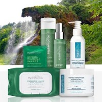 6 pieces of the Hydropeptide Detox skincare product sitting in front of a lush green rainforest with waterfall